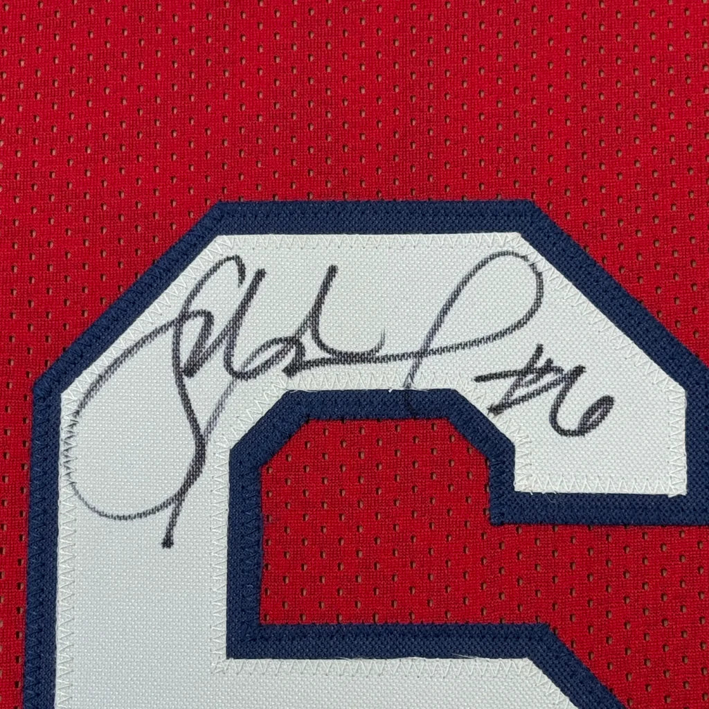 Red Sue Bird Team USA jersey with autograph and action photos in the background