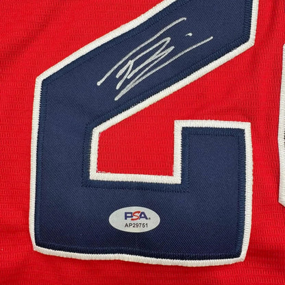 Signed red sports jersey with navy blue and white number 24 and autograph, professionally framed