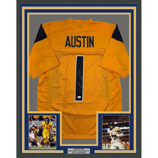 Back of framed autographed Tavon Austin West Virginia navy-orange jersey with JSA COA
