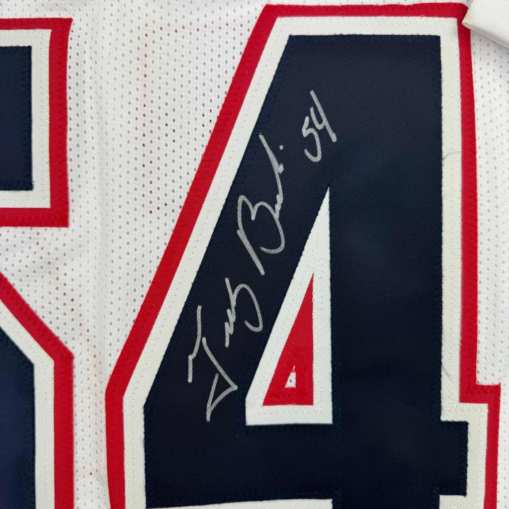 Autographed Tedy Bruschi professionally framed jersey with number 54 for your man cave