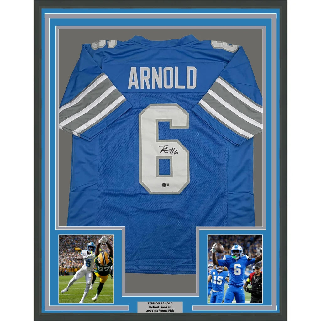Framed autographed Terrion Arnold Detroit Lions blue jersey back, name Arnold number 6, Beckett BAS COA