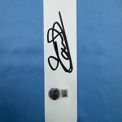 Black ink Thibaut Courtois signature on white card with Beckett BAS sticker