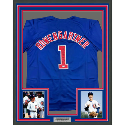 Framed autographed blue Chicago Cubs jersey with red lettering and number one, signed by Thomas Ian Nicholas, Beckett BAS COA