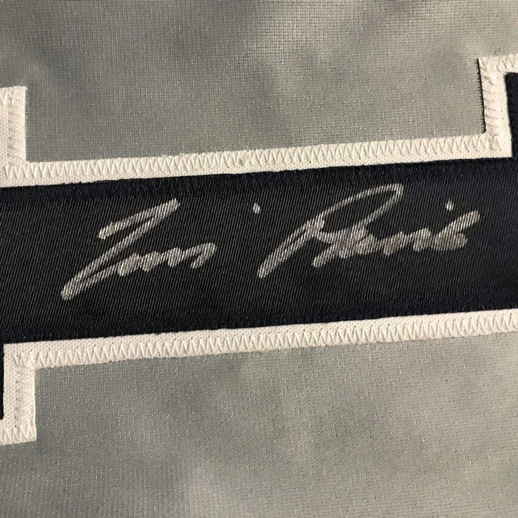 Grey fabric with black embroidered stripe and white trim on Museum Quality Tim Raines Yankees Jersey