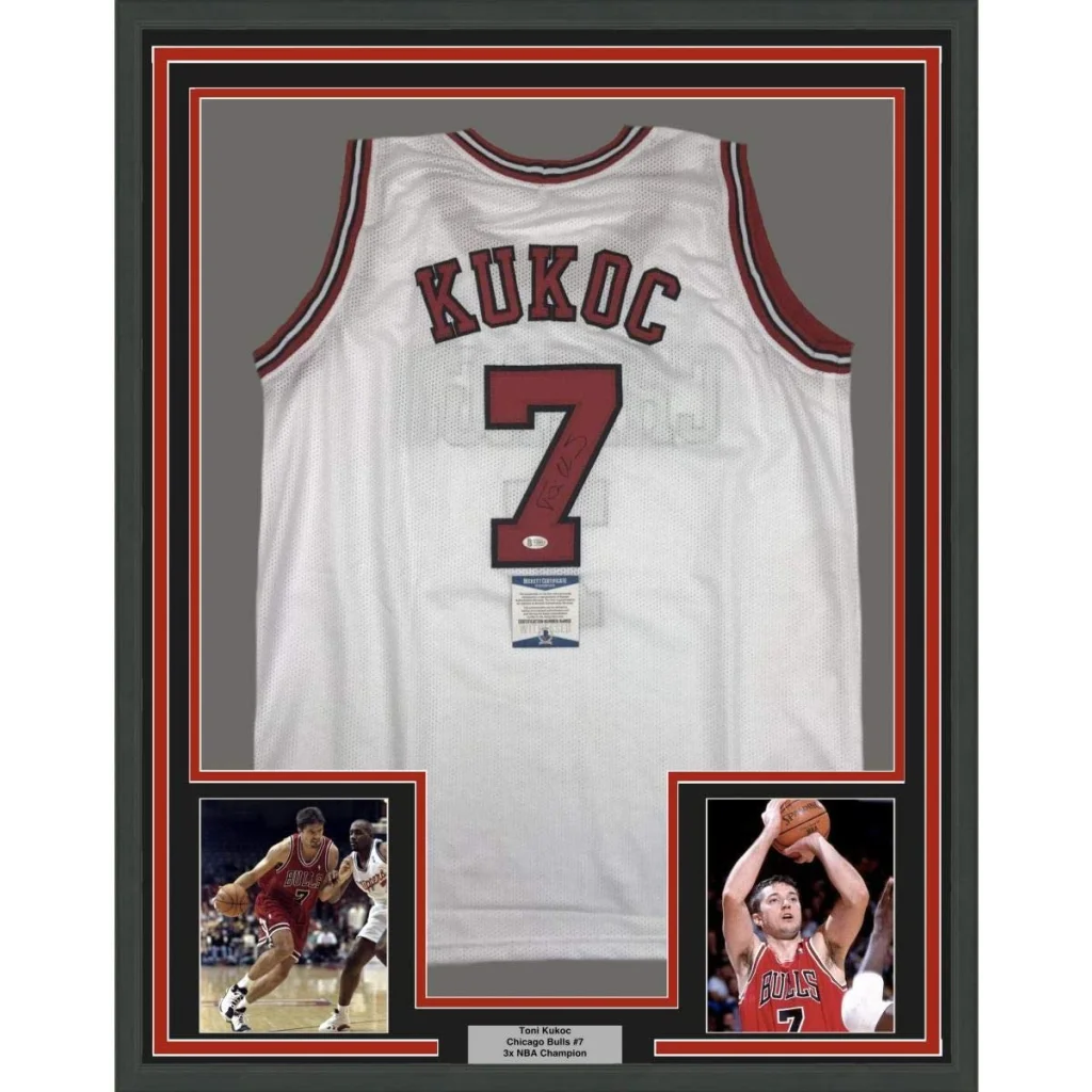 Framed autographed Toni Kukoc white Chicago Bulls jersey with #7, Beckett BAS COA