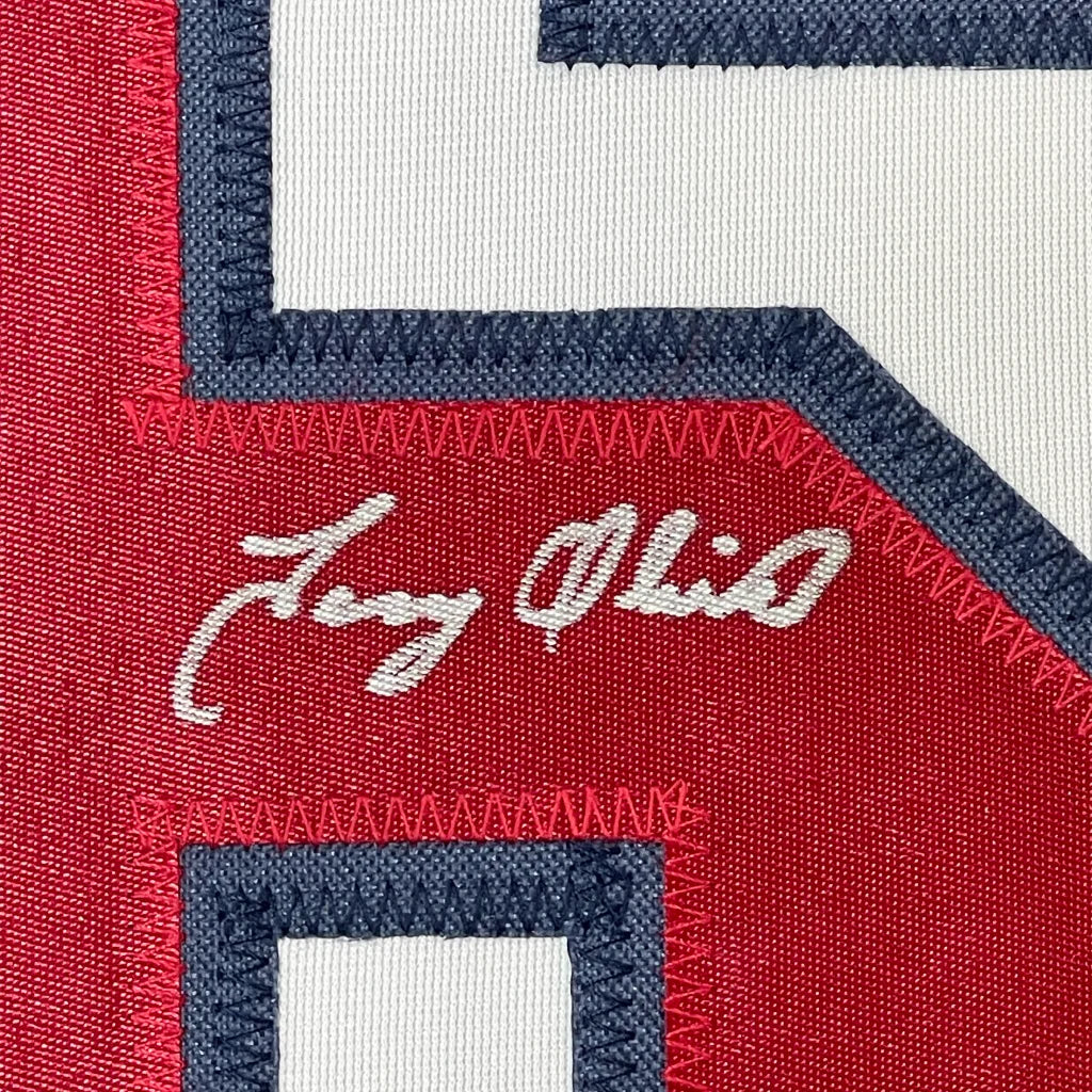 Framed autographed Tony Oliva Minnesota white baseball jersey with red and white embroidery, navy trim, and Jay Ohio script, Beckett BAS COA