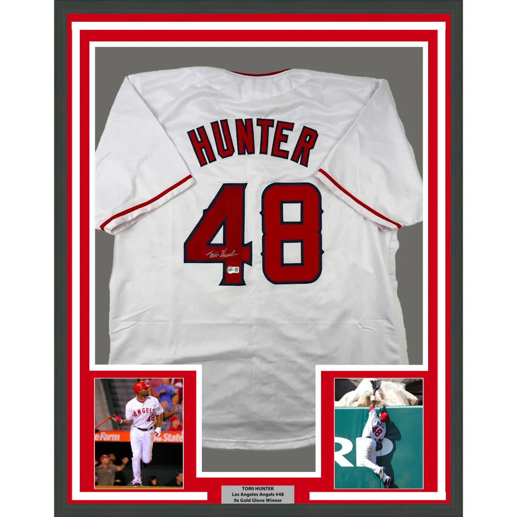 Framed signed Los Angeles Angels Torii Hunter #48 jersey with commemorative photos