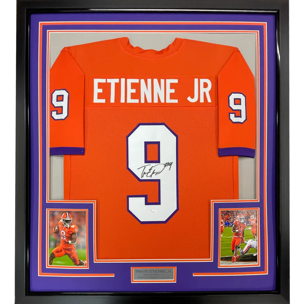 Framed autographed Travis Etienne Jr. Clemson orange football jersey