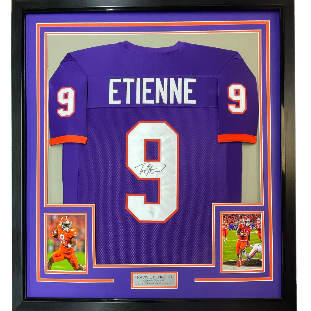 Framed signed Travis Etienne Jr football jersey with photos in premium frame