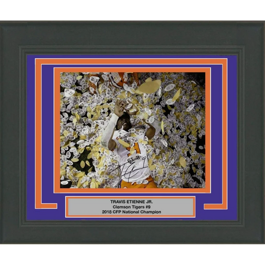 Framed photo of Travis Etienne Jr celebrating Clemson Tigers national championship