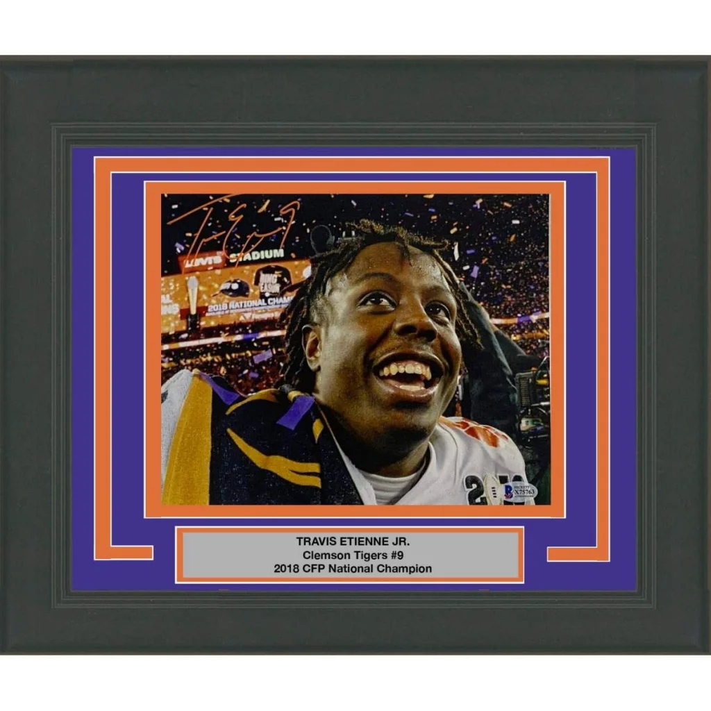 Framed Autographed Travis Etienne Jr Clemson Tigers 8x10 College Football Photo Beckett BAS COA #1 | Hall of Fame Sports Memorabilia | vintageantiquesgifts.com