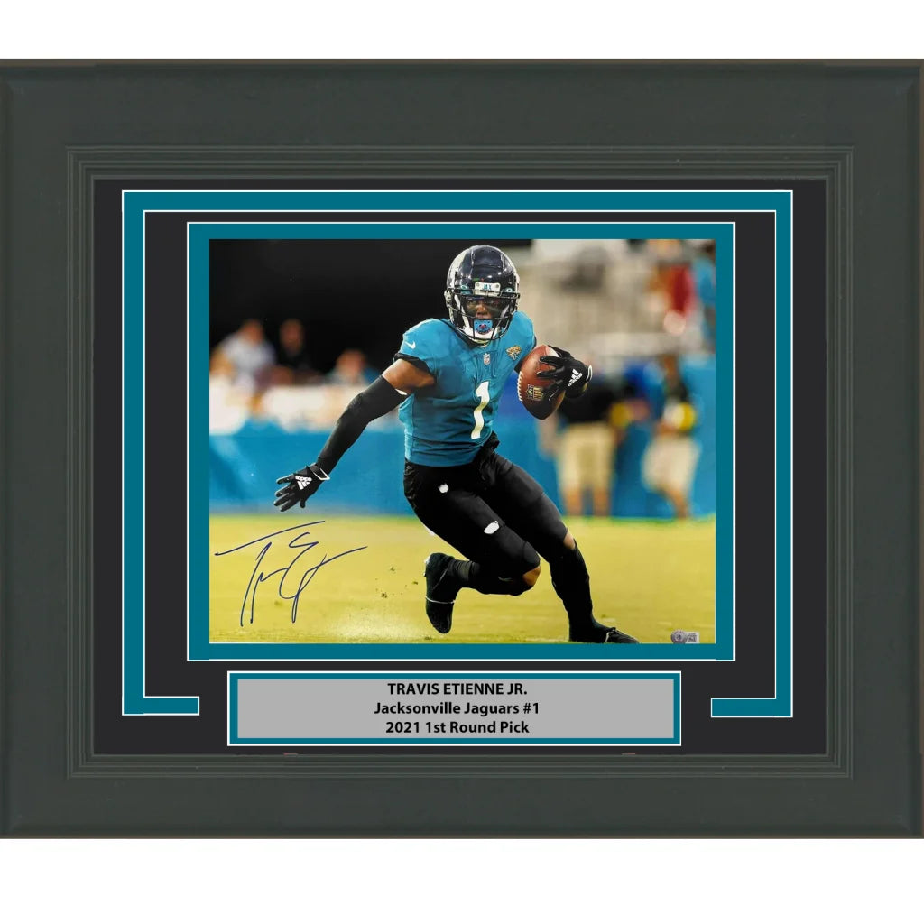 Framed Autographed Travis Etienne Jr Jacksonville Jaguars 16x20 Football Photo Beckett BAS COA | Hall of Fame Sports Memorabilia | vintageantiquesgifts.com