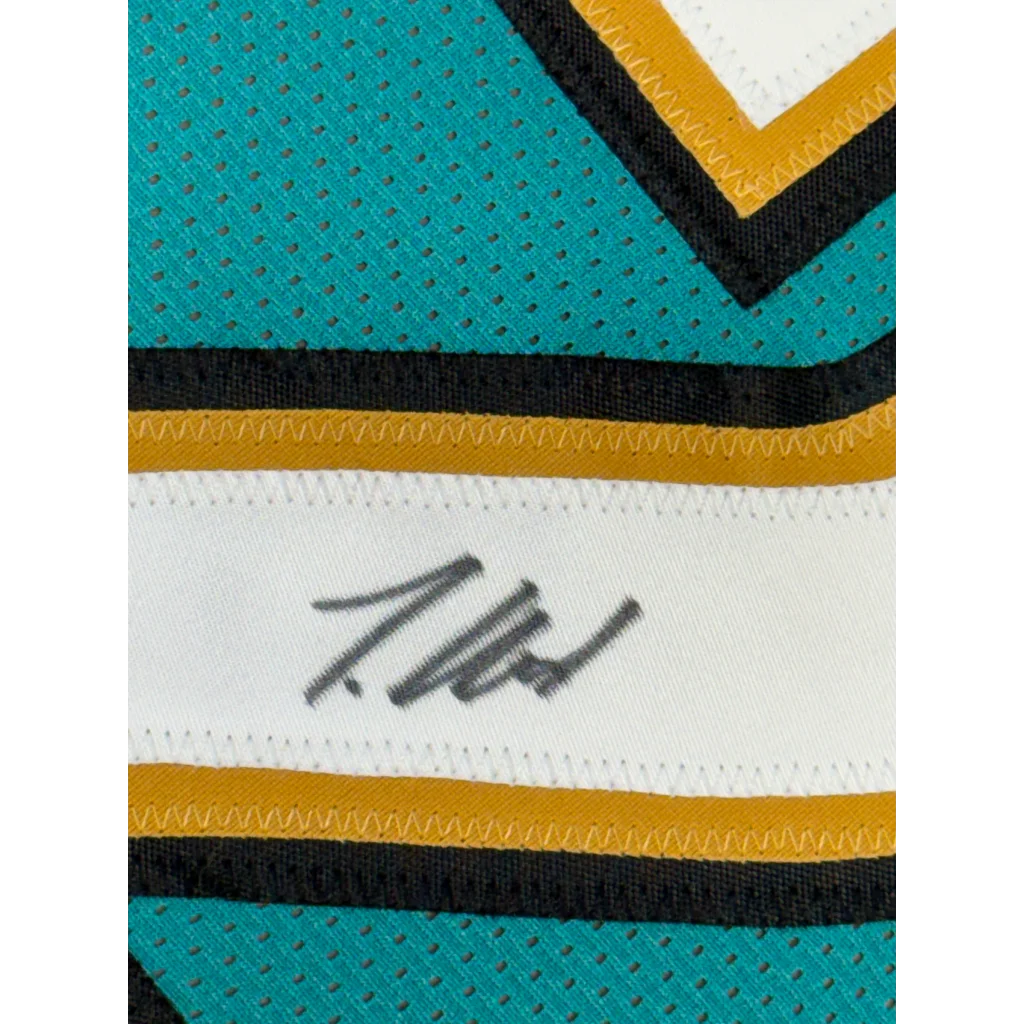 Framed Autographed Travis Hunter 35x39 Jacksonville Teal Retro Football Jersey Beckett BAS COA | Certified Authentic Signed Memorabilia | vintageantiquesgifts.com