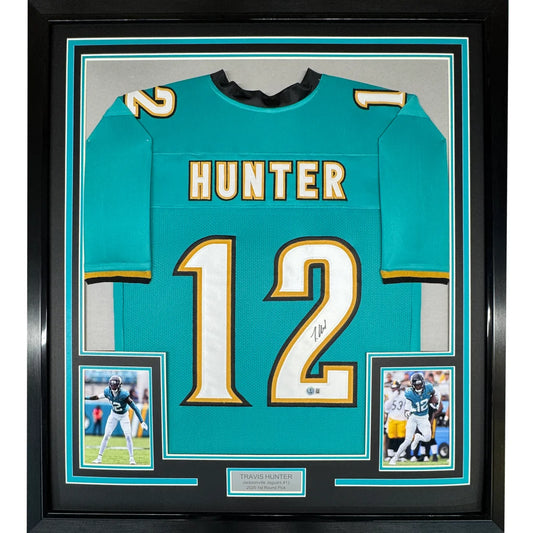 Framed Autographed Travis Hunter 35x39 Jacksonville Teal Retro Football Jersey Beckett BAS COA | Hall of Fame Sports Memorabilia | vintageantiquesgifts.com