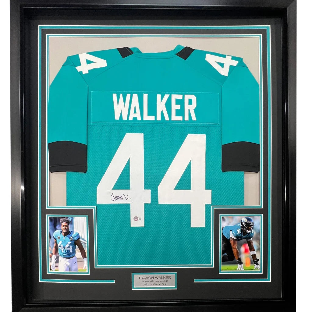 Framed Autographed Travon Walker 35x39 Jacksonville Teal Football Jersey Beckett BAS COA | Hall of Fame Sports Memorabilia | vintageantiquesgifts.com