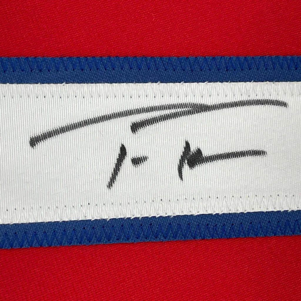 Autographed white fabric tag on a red Championship Ready Framed Baseball Jersey