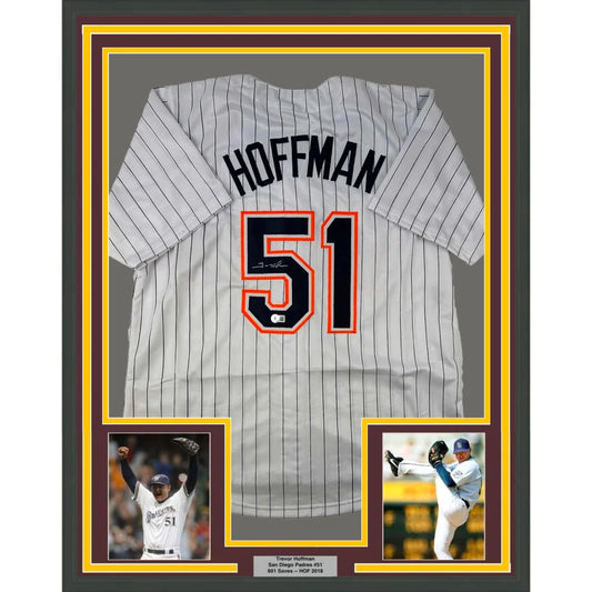 Framed Trevor Hoffman autographed Padres jersey with two small photos