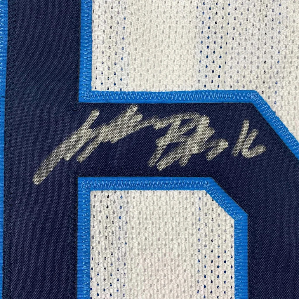 Autographed Treylon Burks Titans jersey with photos ready to display and show off your team pride