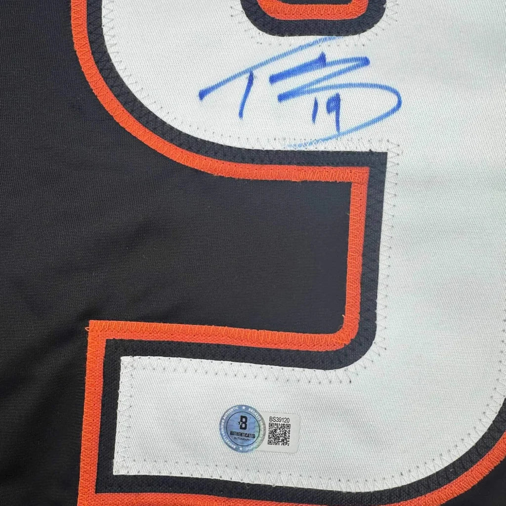 Black Troy Terry Ducks jersey with white and orange trim, autograph, and hologram sticker
