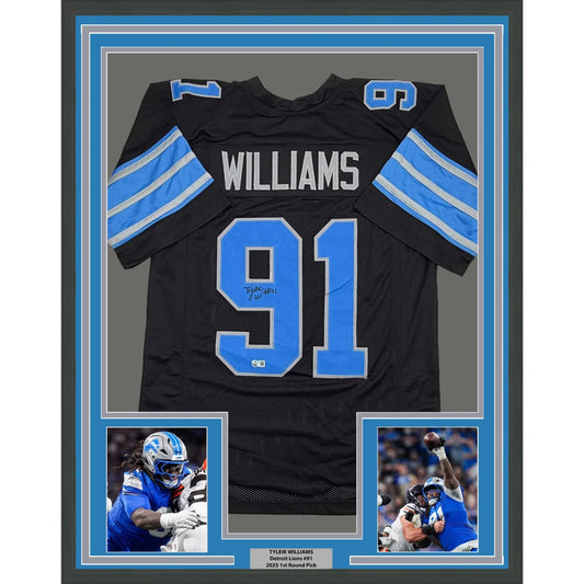 Framed Autographed Tyleik Williams 35x39 Detroit Black Football Jersey Beckett BAS COA | Hall of Fame Sports Memorabilia | vintageantiquesgifts.com