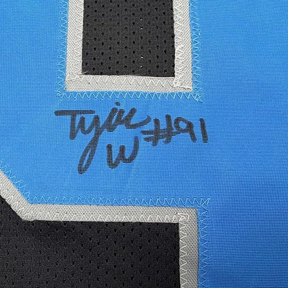 Framed Autographed Tyleik Williams 35x39 Detroit Black Football Jersey Beckett BAS COA | Certified Authentic Signed Memorabilia | vintageantiquesgifts.com