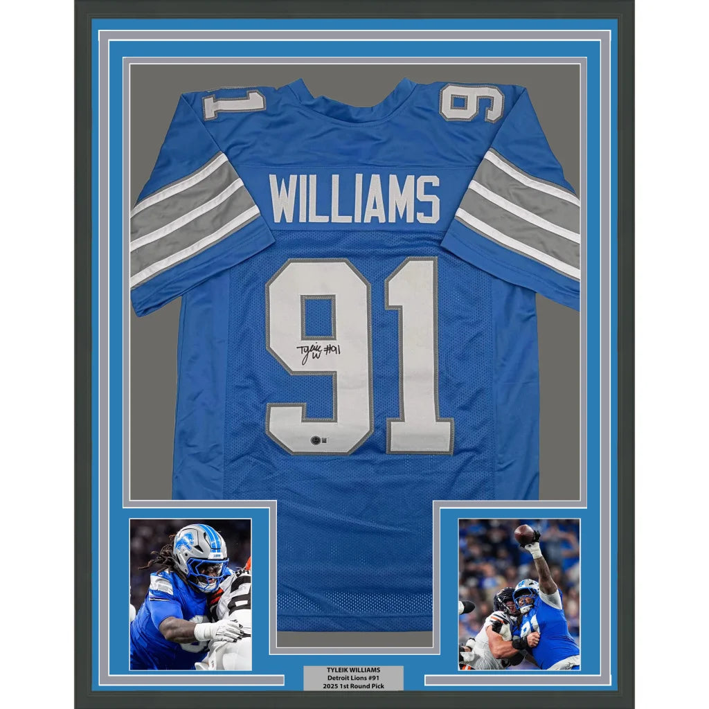 Framed autographed Tyleik Williams Detroit Lions blue jersey, name Williams 91, Beckett BAS COA