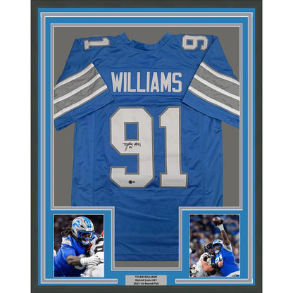 Framed autographed Tyleik Williams Detroit Lions blue jersey, name Williams 91, Beckett BAS COA