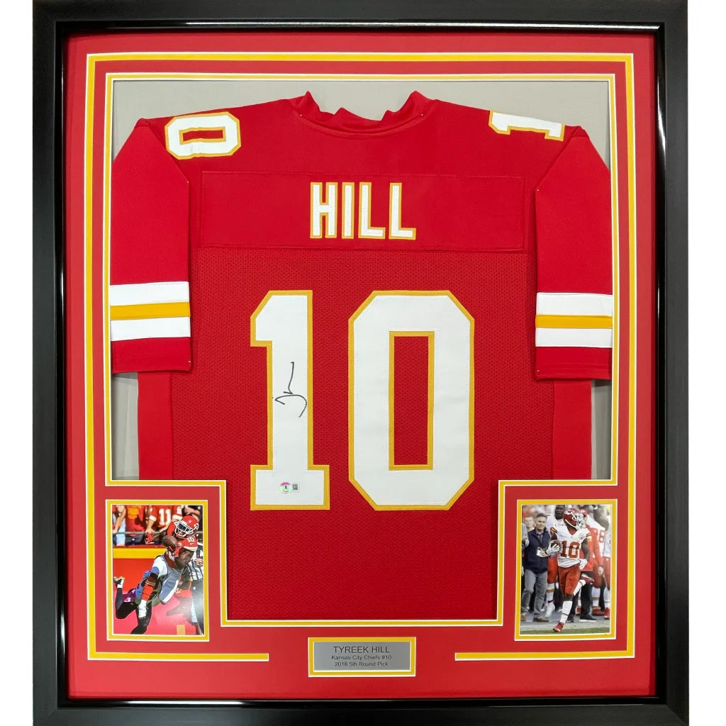Framed autographed Tyreek Hill red Kansas City Chiefs jersey with name Hill and number 10