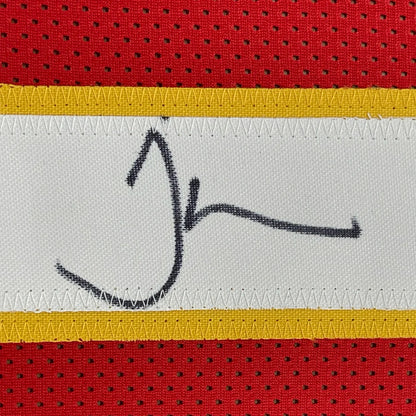 Framed autographed Tyreek Hill Kansas City red jersey with black stitched signature on white fabric strip, yellow and red perforated mesh border, JSA COA