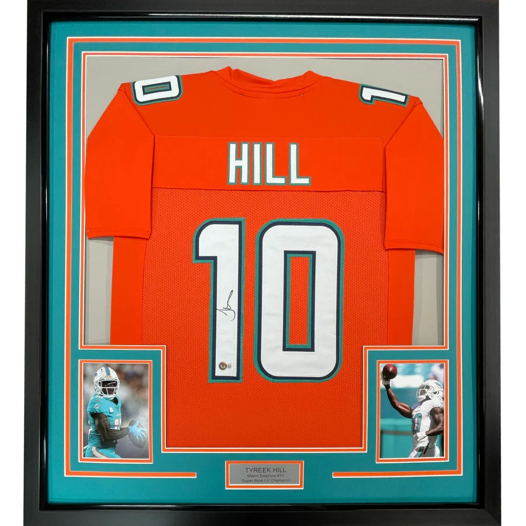 Framed autographed Tyreek Hill Miami Dolphins orange retro jersey with white number 10 and teal Hill name, JSA COA