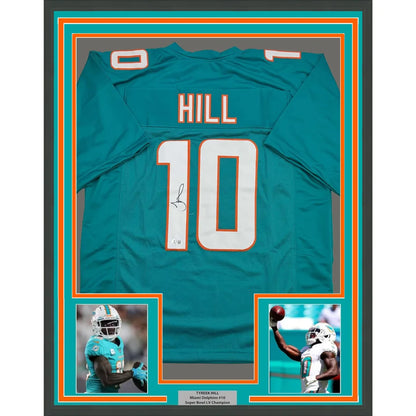 Framed Autographed Tyreek Hill 35x39 Miami Teal Football Jersey Beckett BAS COA | Hall of Fame Sports Memorabilia | vintageantiquesgifts.com