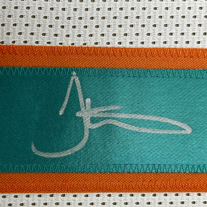 Framed autographed Tyreek Hill Miami white football jersey with teal orange stripes