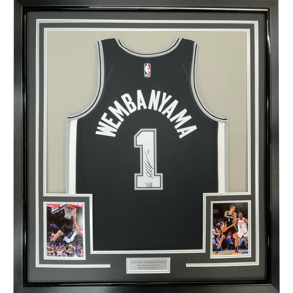 Framed Victor Wembanyama signed Spurs jersey with two action shots on display