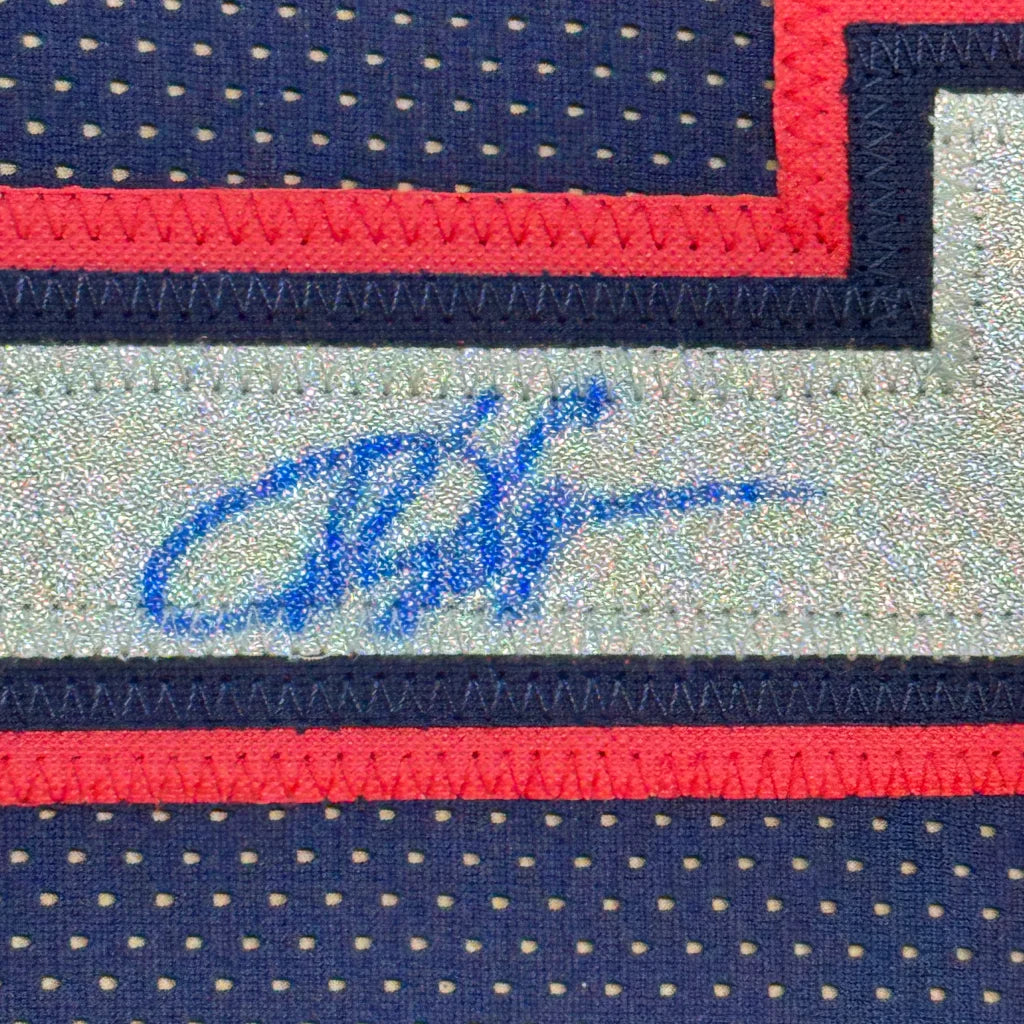 Framed autographed Vince Carter New Jersey Navy blue basketball jersey with blue signature on silver mesh