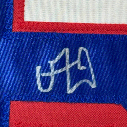 Framed autographed Vincent Trocheck New York Rangers jersey with white embroidered signature on blue and red patch, JSA COA