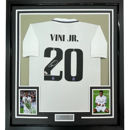 Framed Autographed Vini Vinicius Jr. 35x39 Real Madrid 2022-23 White Soccer Jersey Beckett BAS COA | Hall of Fame Sports Memorabilia | vintageantiquesgifts.com