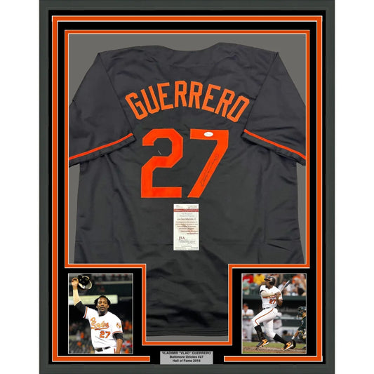 Framed Vladimir Guerrero Orioles jersey with autographs, display photos, and premium matting