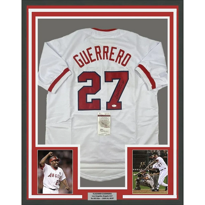 Framed autographed Vladimir Guerrero white baseball jersey with red Guerrero 27 back