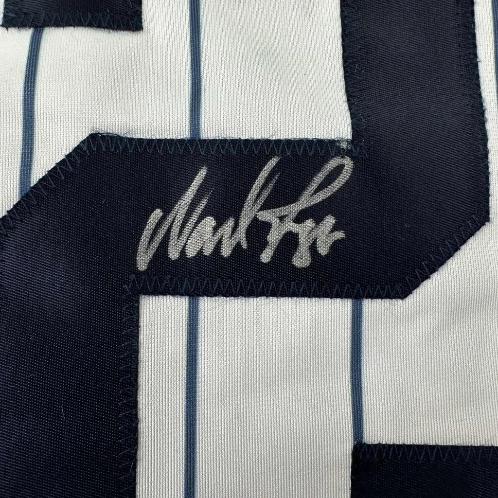 Framed autographed Wade Boggs navy blue New York Pinstripe baseball jersey with signature patch, Beckett BAS COA