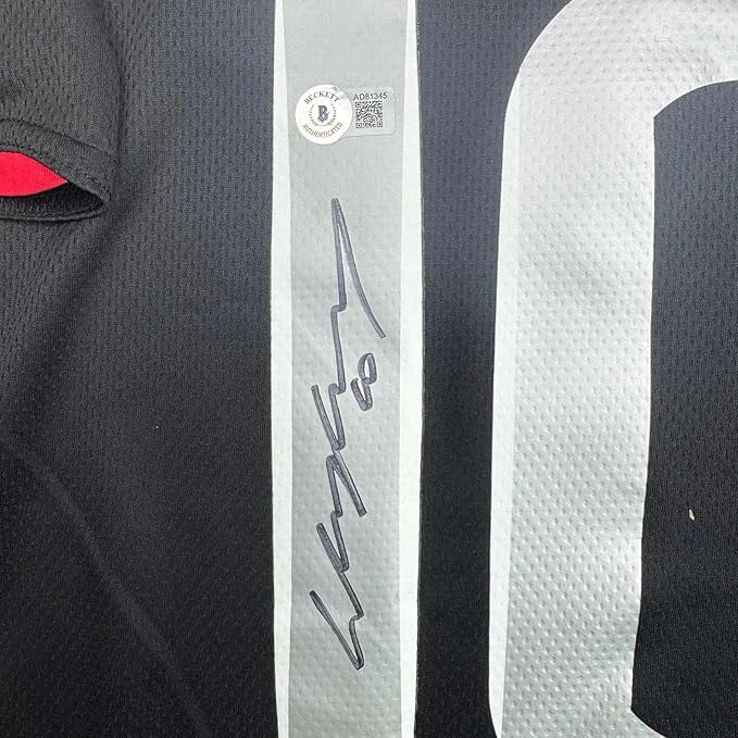 Framed autographed Wayne Rooney Manchester United black jersey with Beckett COA