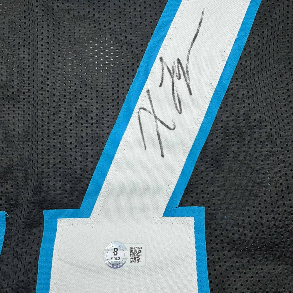 Framed autographed white and blue xavier legette football jersey strap with black signature and witness authentication sticker