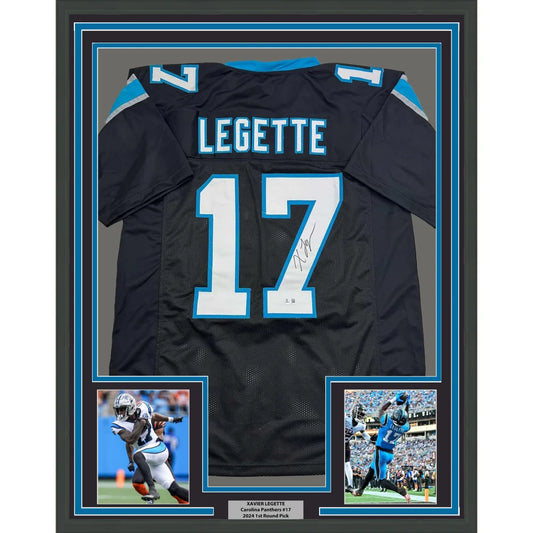 Framed autographed black Carolina Panthers football jersey with white and light blue numbering signed by Xavier Legette