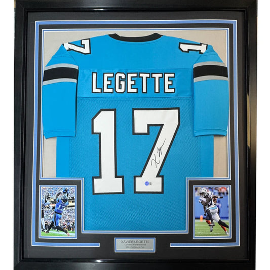 A framed carolina panthers carolina blue football jersey signed by xavier legette with name legette and number 17