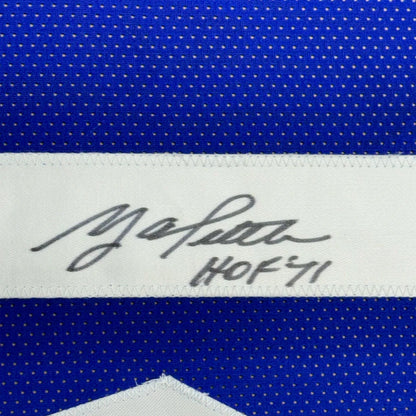 Autographed Blue Tittle HOF Jersey with JSA COA for the ultimate man cave setup