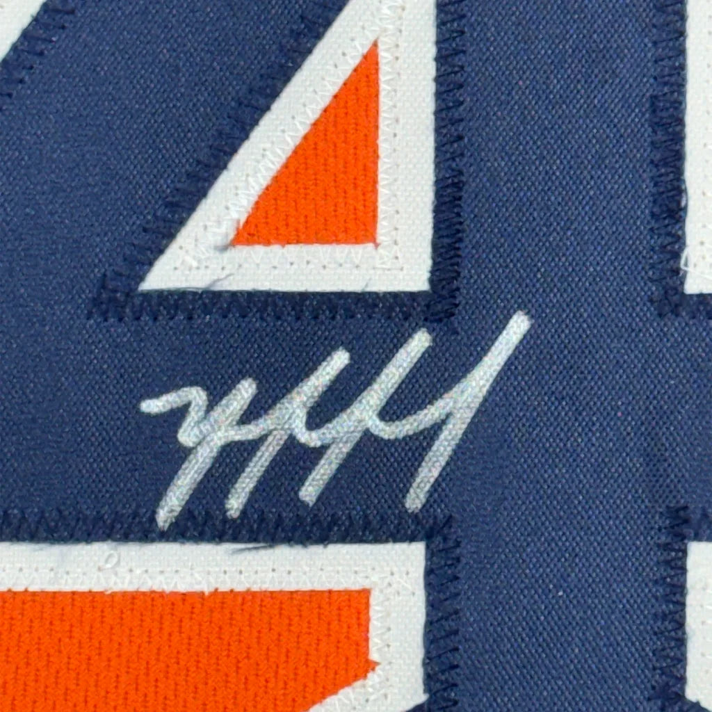 Framed autographed Yordan Alvarez orange Houston Astros jersey with blue-orange embroidered number four and silver signature