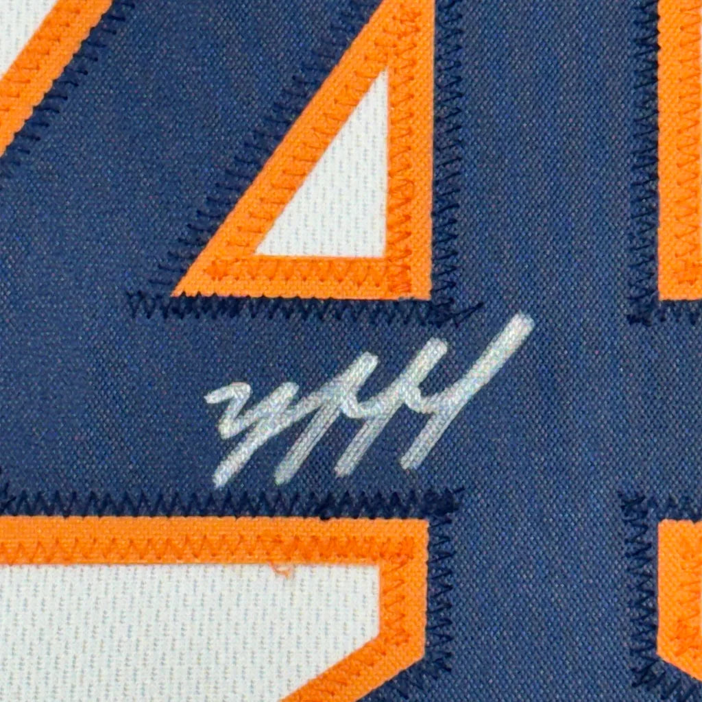 Framed autographed Yordan Alvarez Houston Astros white jersey with navy blue and orange embroidered number four patch and white stitched signature, JSA COA