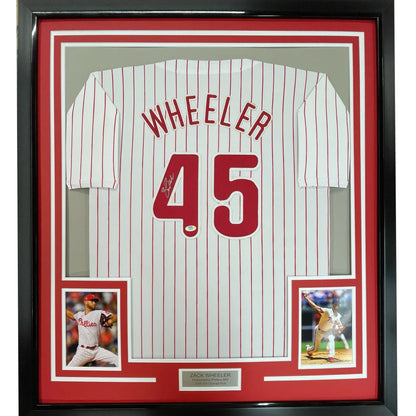 Framed autographed Zack Wheeler Philadelphia pinstripe jersey with red pinstripes, name Wheeler and number 45 on back, PSA/DNA COA