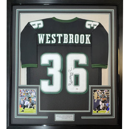 Framed Brian Westbrook Eagles jersey with autograph, action shots, and nameplate ready to hang