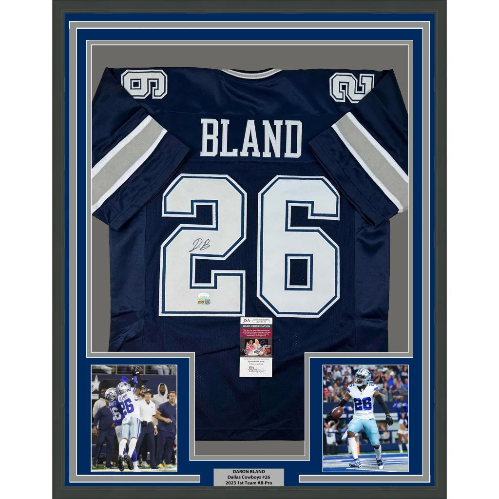 Framed Dallas Cowboys Bland #26 jersey with action photos and plaque ready to hang