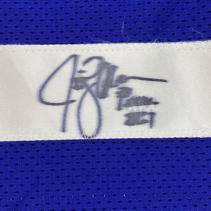 Blue Seahawks sports jersey with white tag and black Jim Zorn autograph for framing